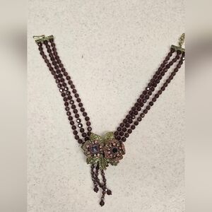 Elegant Brown Beaded Necklace with Floral Accents